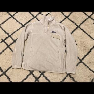Cream colored two toned Patagonia fleece pullover.